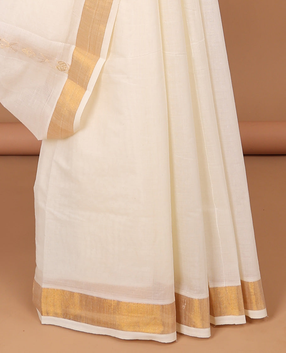 Cream kerala saree with zari stripes, zari border & pallu of floral designs