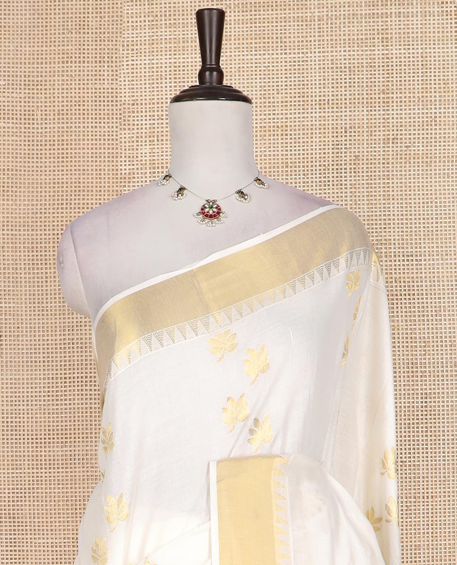 Cream leaf buttas Kerala cotton saree, zari temple border, and leaf zari design pallu