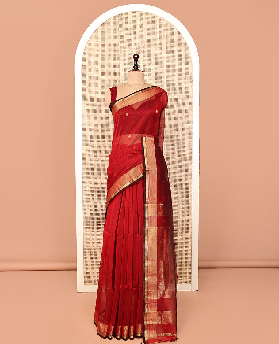 Red Maheshwari Cotton Saree, Ornamented with Zari Buttas on Its Body, Highlighted by Traditional Zari Border, Scintillating Pallu Steeped with Zari Stripes, and Paired with a Matching Blouse