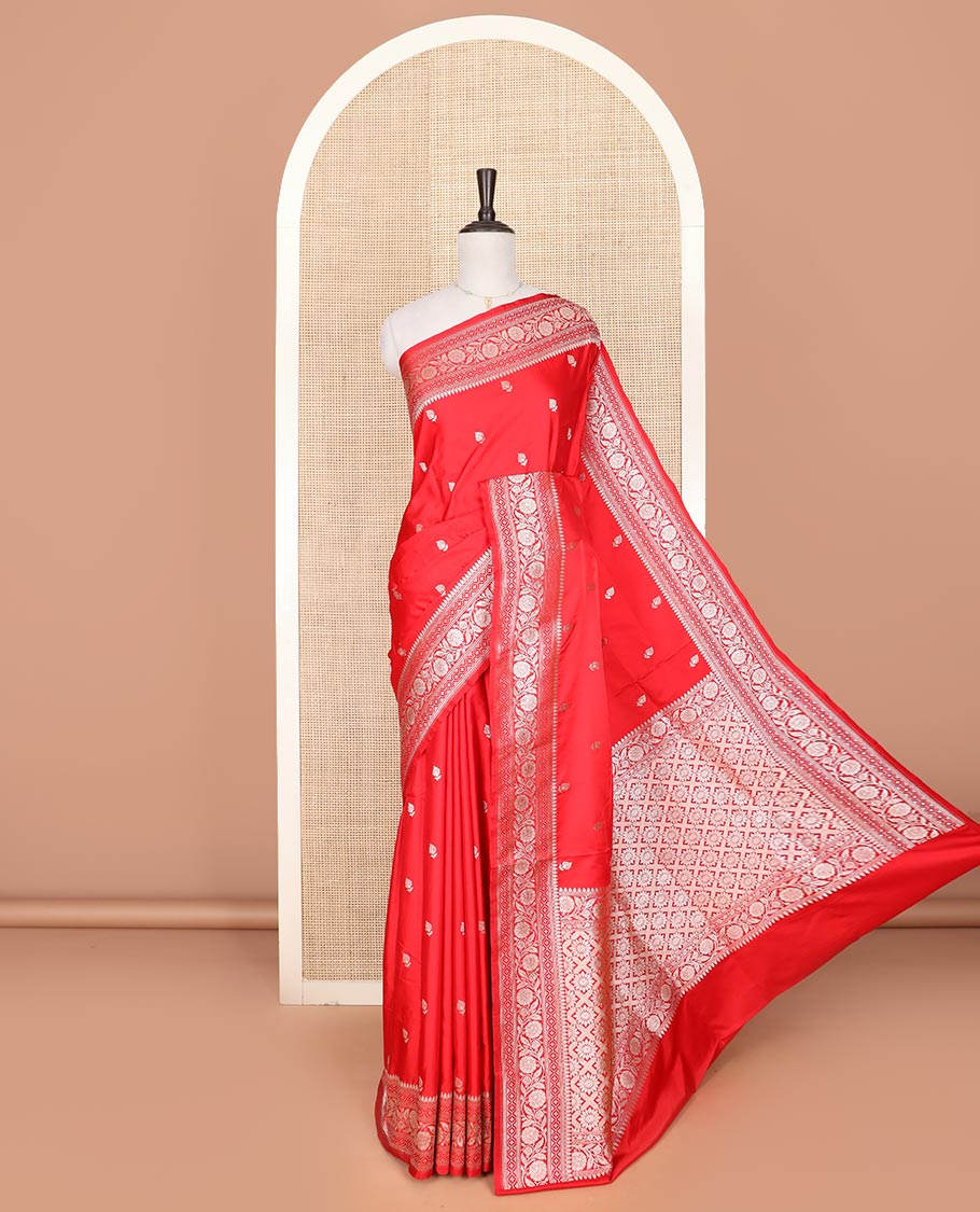 Red buttas mushru silk saree, traditional border of floral creeper designs, and zari-rich jaal pallu