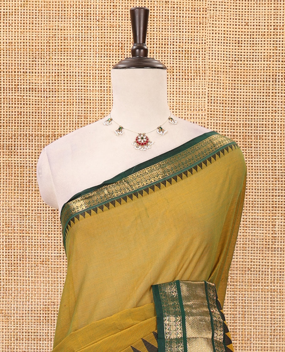 Mehendi green plain Chettinad cotton saree, contrast temple traditional zari design border, striped pallu & matching plain zari border blouse