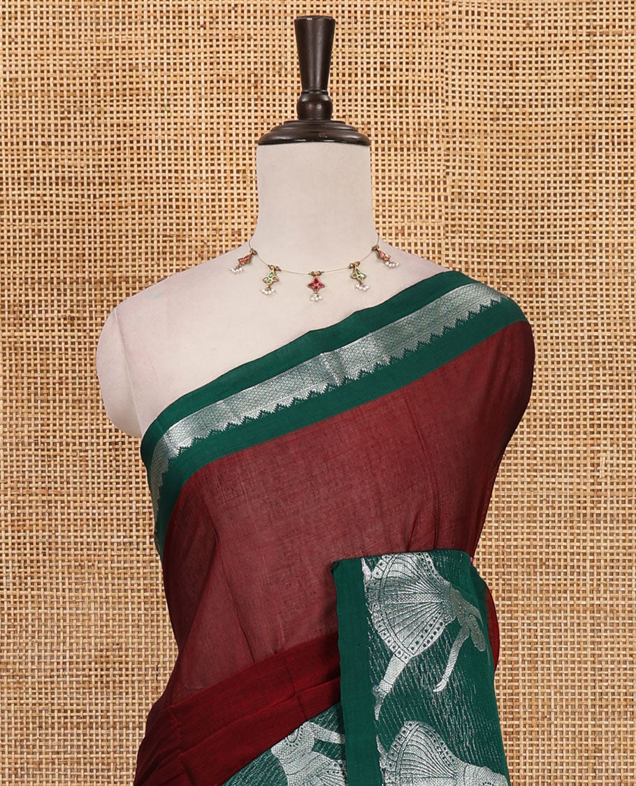 Maroon full-plain Mercerised cotton saree, contrast sliver zari Dancing Bharatanatyam girl motifs woven border, striped pallu & plain blouse