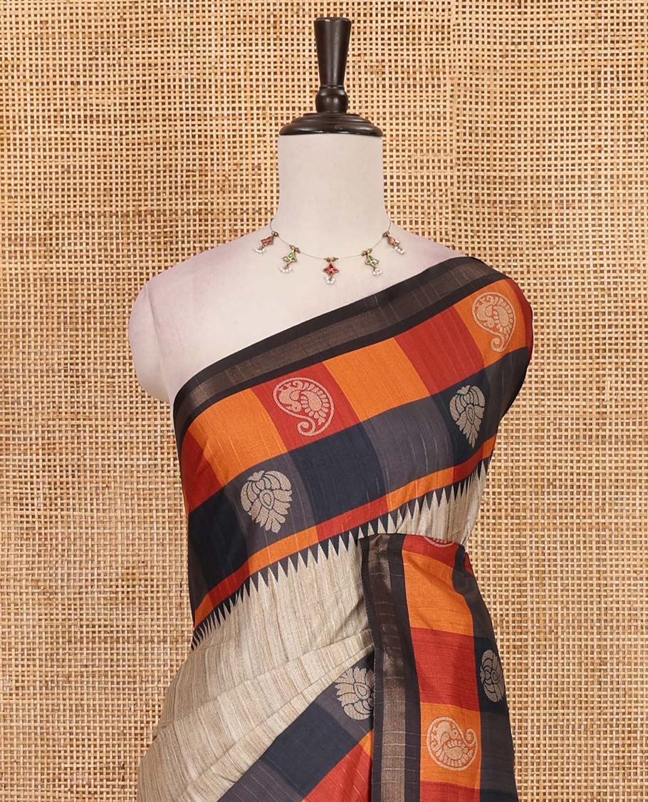 Chikku-black plain kathan silk saree, contrast buttas enclosed multi-color checked blocks border, temple pallu, and contrast blouse of checks, and buttas