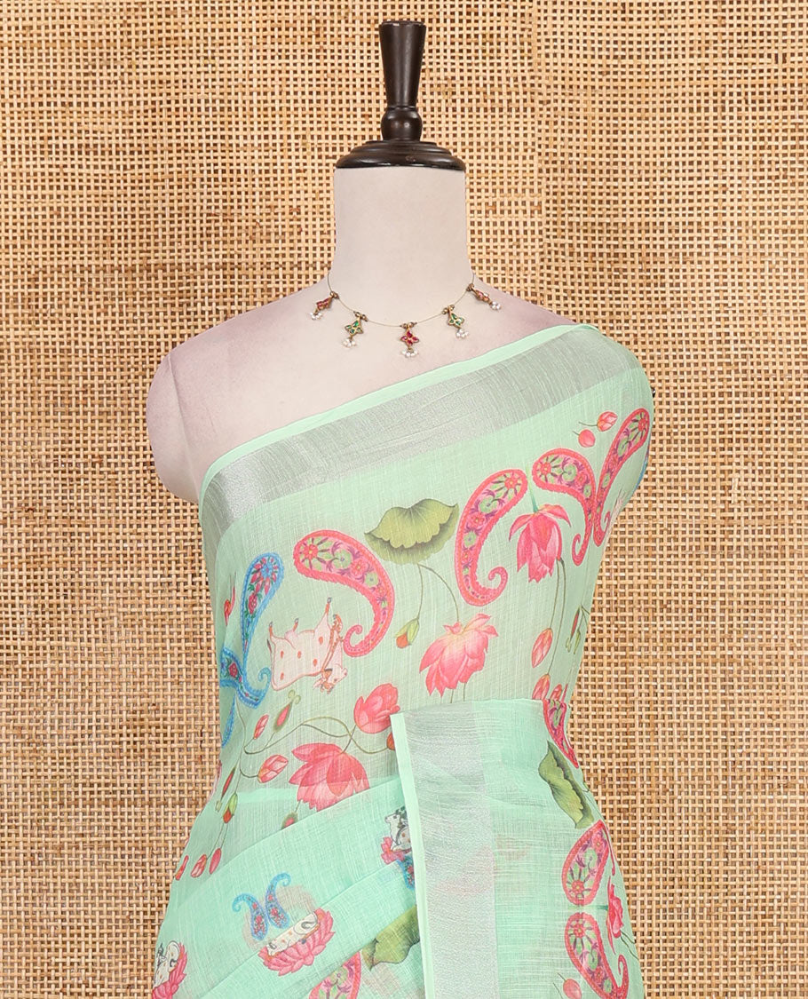 Apple green Pichwai Lotus, cow, and paisleys printed linen cotton saree, silver zari border, striped pallu and plain blouse