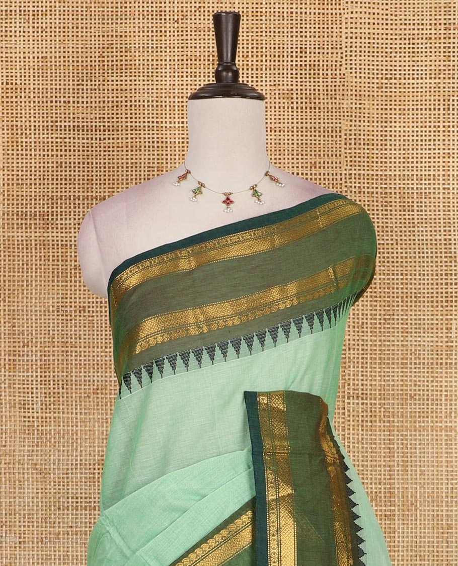 Green plain Chettinad cotton saree, contrast traditional zari rettai pettu temple border, striped pallu and plain blouse