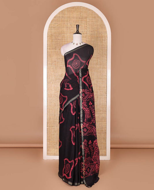 Ink blue batik geometric printed pure cotton saree, zari piping border, human figurines batik printed pallu, and a matching batik printed blouse