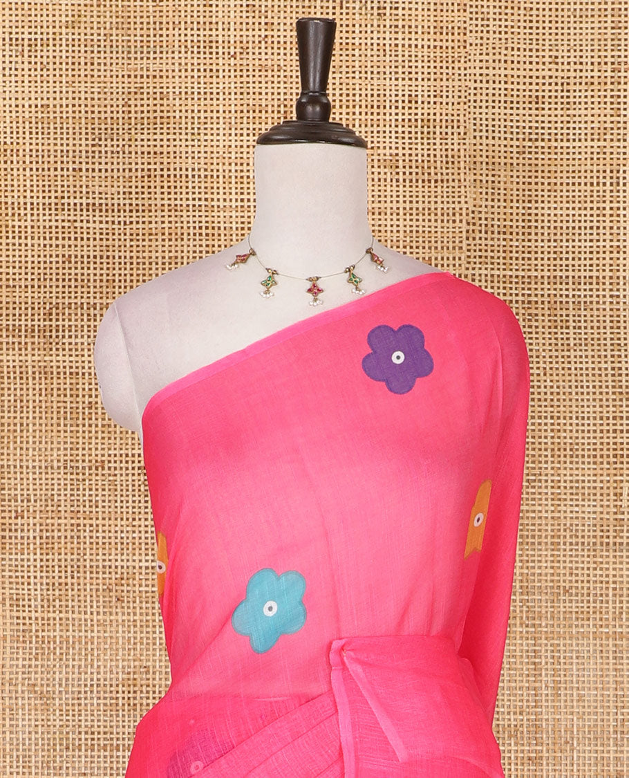 Borderless pink colorful five-petal flower motifs printed linen cotton saree, multi-color striped pallu, and contrast printed blouse