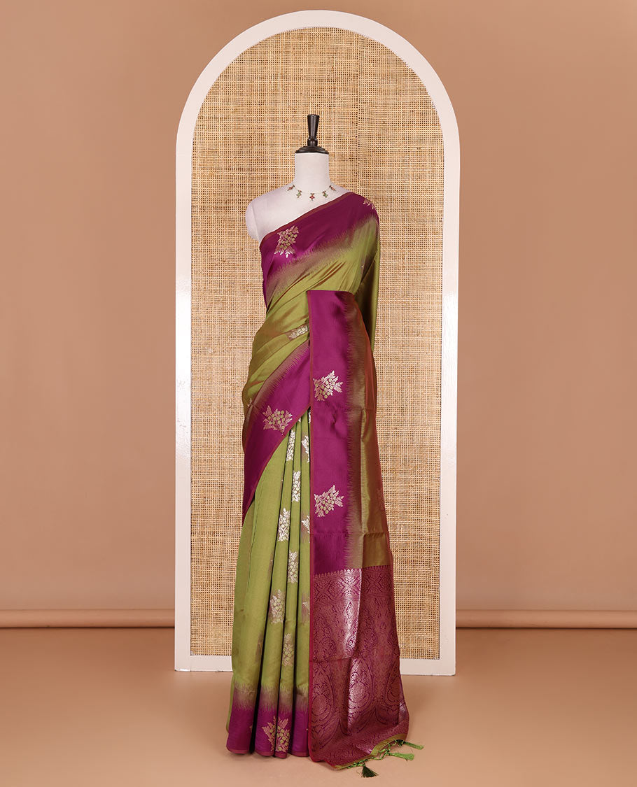 Green-purple floral buttas elite soft silk saree, contrast floral buttas border, and pallu of Mughal-style intricate zari designs