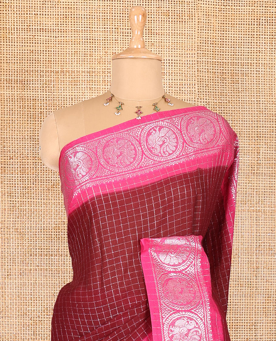 Maroon and pink checked sungudi cotton saree, contrast silver zari round peacock border, striped pallu, and a contrast checked blouse