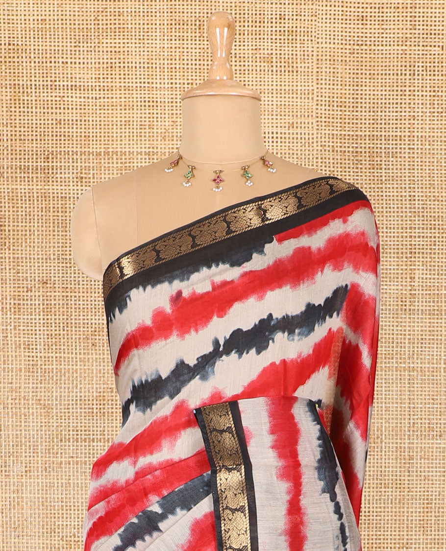 Red shibori printed muslin cotton saree, contrast peacock zari border, village scenery printed pallu, and a contrast polka dotted zari border blouse