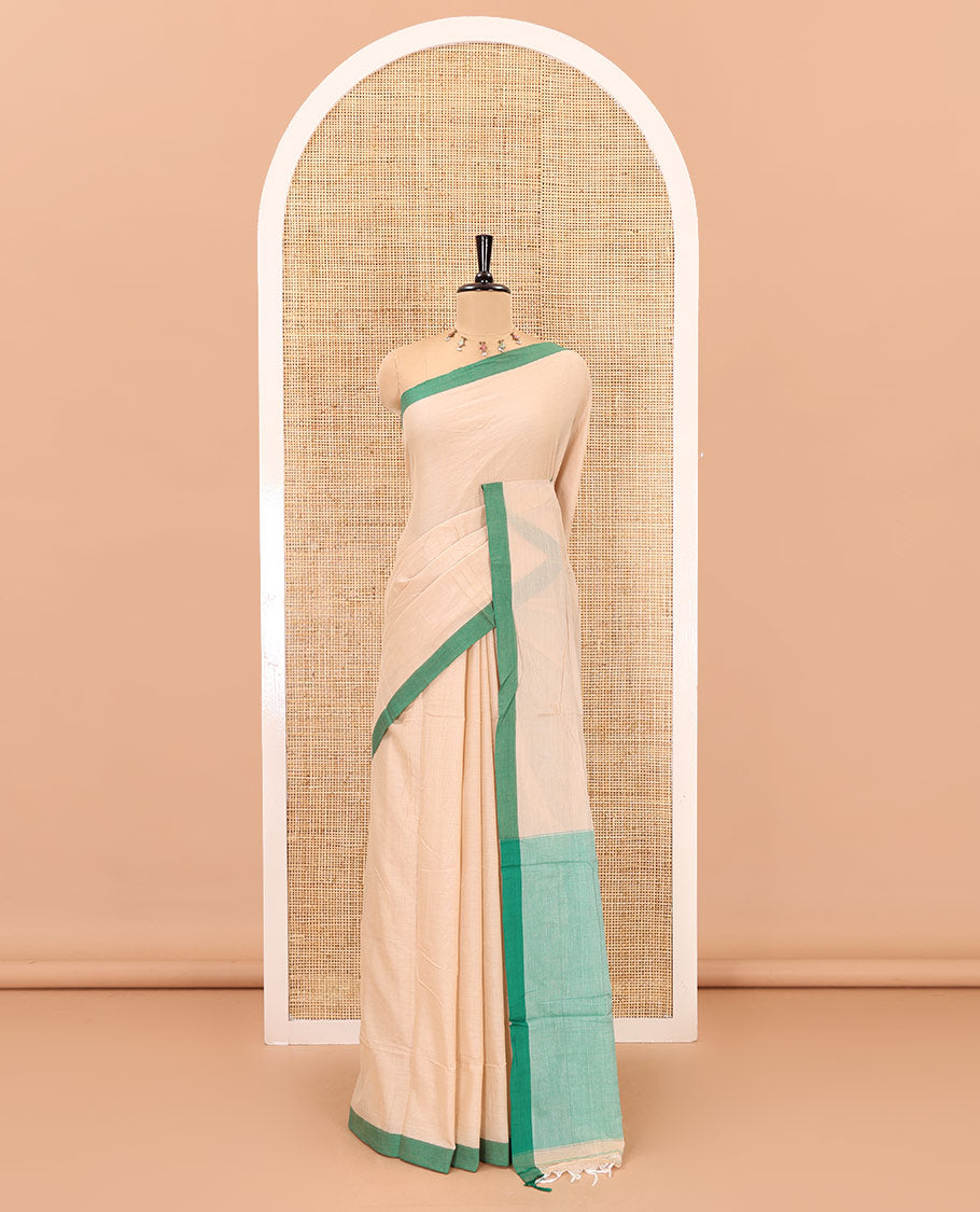 Cream-green plain mercerised cotton saree,contrast plain border, striped pallu, and a contrast plain blouse