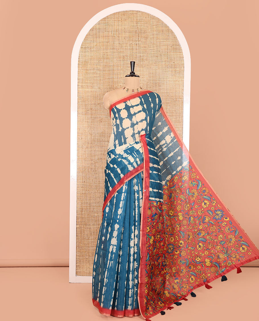 Peacock Blue Mercerised Cotton Saree, Decked Up with Shibori Printed on Its Body, Complemented by a Contrast Border, Pallu Steeped with Colorful Floral Print, and Paired with a Contrast Printed Blouse