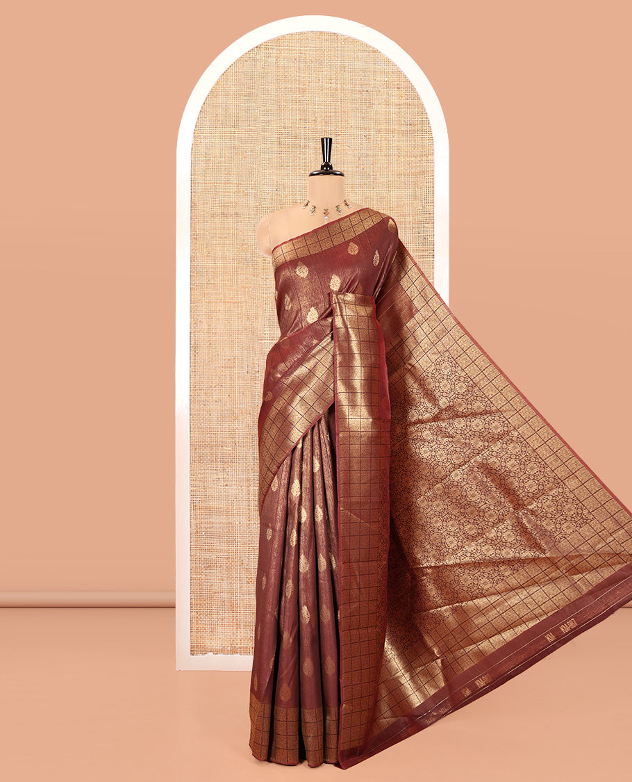 Brown Kanchi Silk Saree, Mesmerized with Zari Buttas All Over Its Body, Highlighted by Zari Checked Border, a Grandly Decked Up Pallu, and Paired with a Chevron Jacquard Blouse