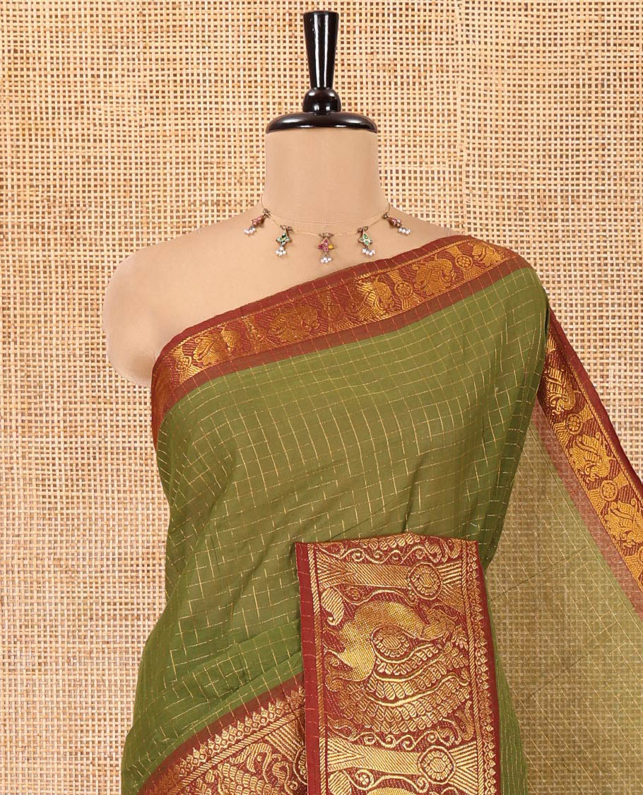 Olive Green Chettinad Cotton Saree, Gleamed Up Checked Design All Over Its Body, Complemented by a Contrast Traditional Zari Border of Peacock Designs, Zari-Striped Pallu, and Has No Blouse