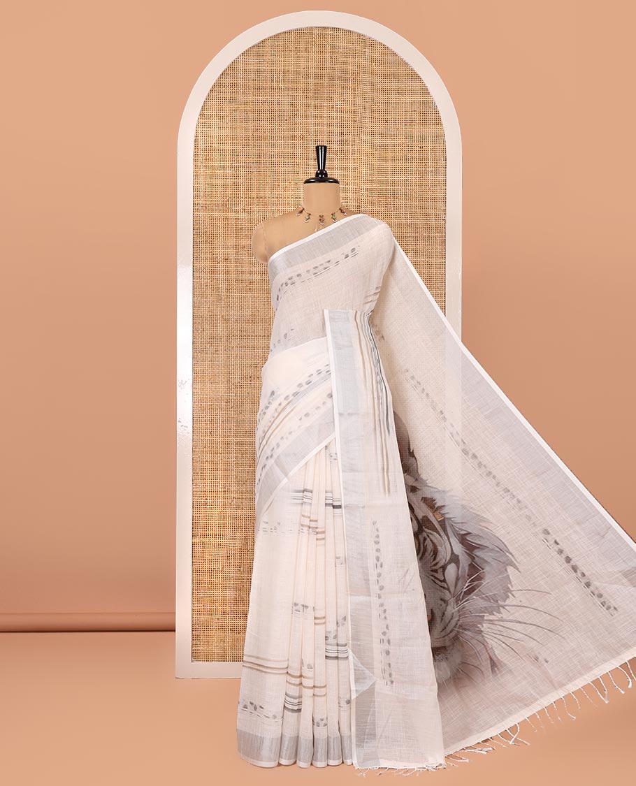 Cream Linen Cotton Saree, Subtly Sparkled with Ikkat-Style Print on Its Body, a Subtle Zari Border, Pallu of Big Tiger Picture Print, and Paired with a Matching Blouse