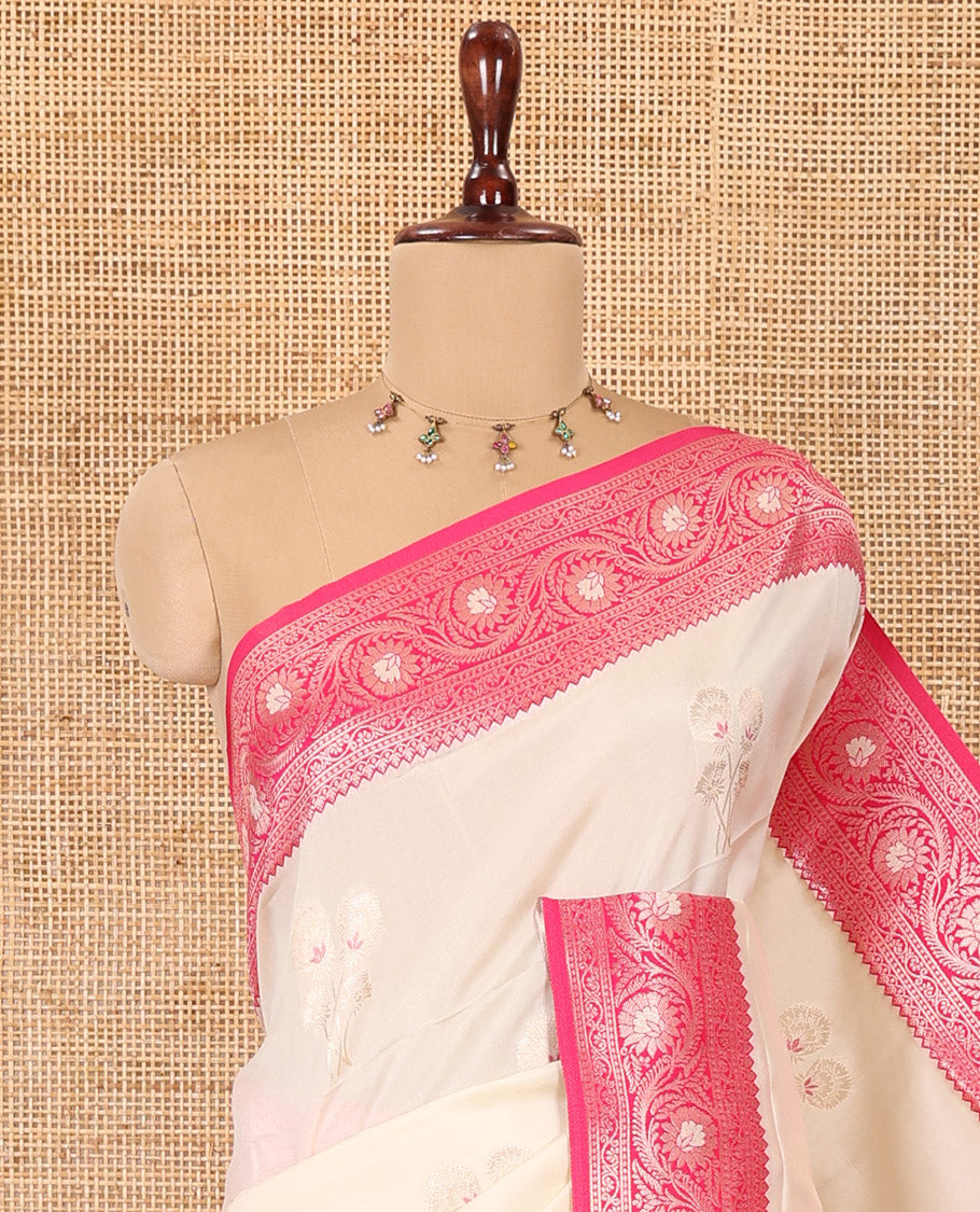 Cream-Rani Pink Elite Soft Silk Saree, Embellished with Zari Buttas, a Contrast Floral Creeper Border, Intricate Pallu, and a Contrast Blouse