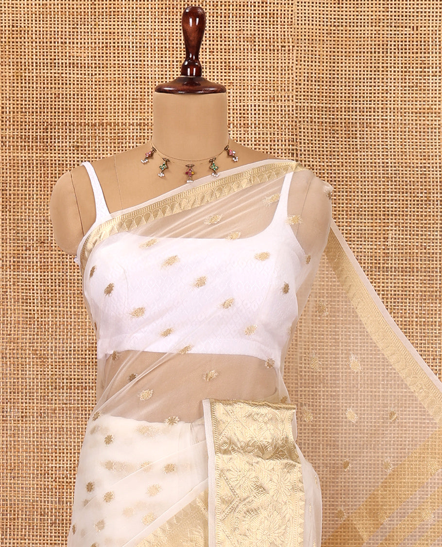 Cream Semi-Organza Saree, Steeped in Richness of Zari Buttas, Highlighted by a Zari Floral Creeper Border, and a Matching Blouse