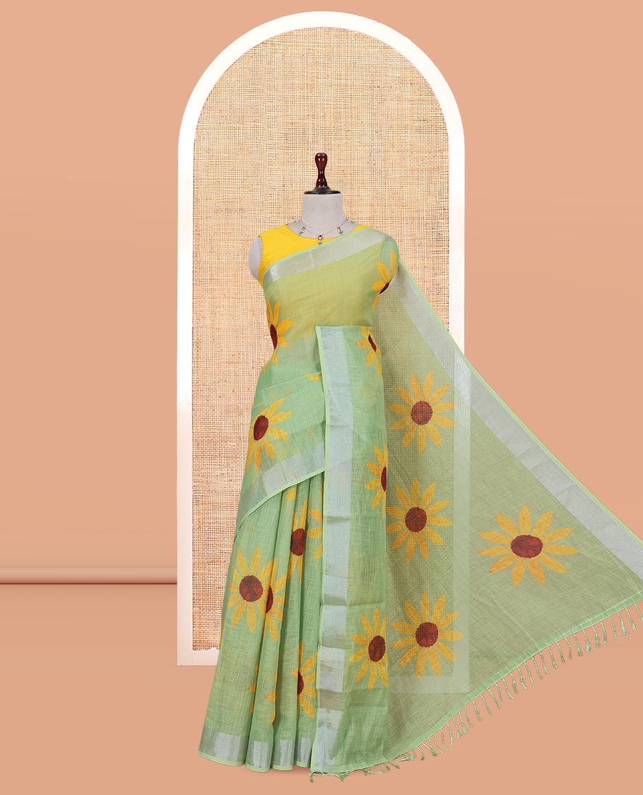 Green Linen Cotton Saree, Beautified with Sunflower Print, a Zari Border, and a Matching Blouse