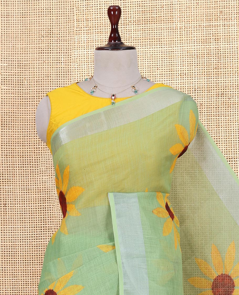 Green Linen Cotton Saree, Beautified with Sunflower Print, a Zari Border, and a Matching Blouse