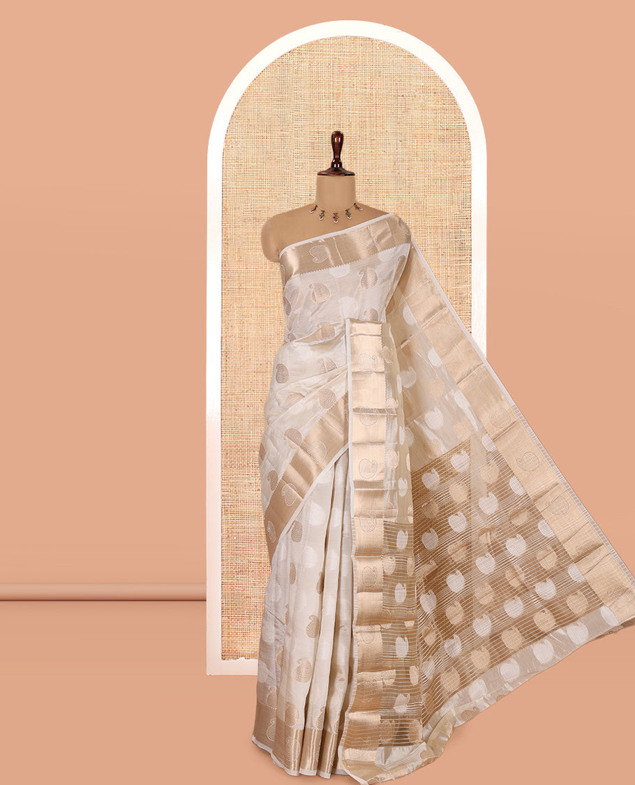 Cream Semi-Tussar Saree Features Paisley Buttas, a Zari Paisley Border, and a Matching Blouse