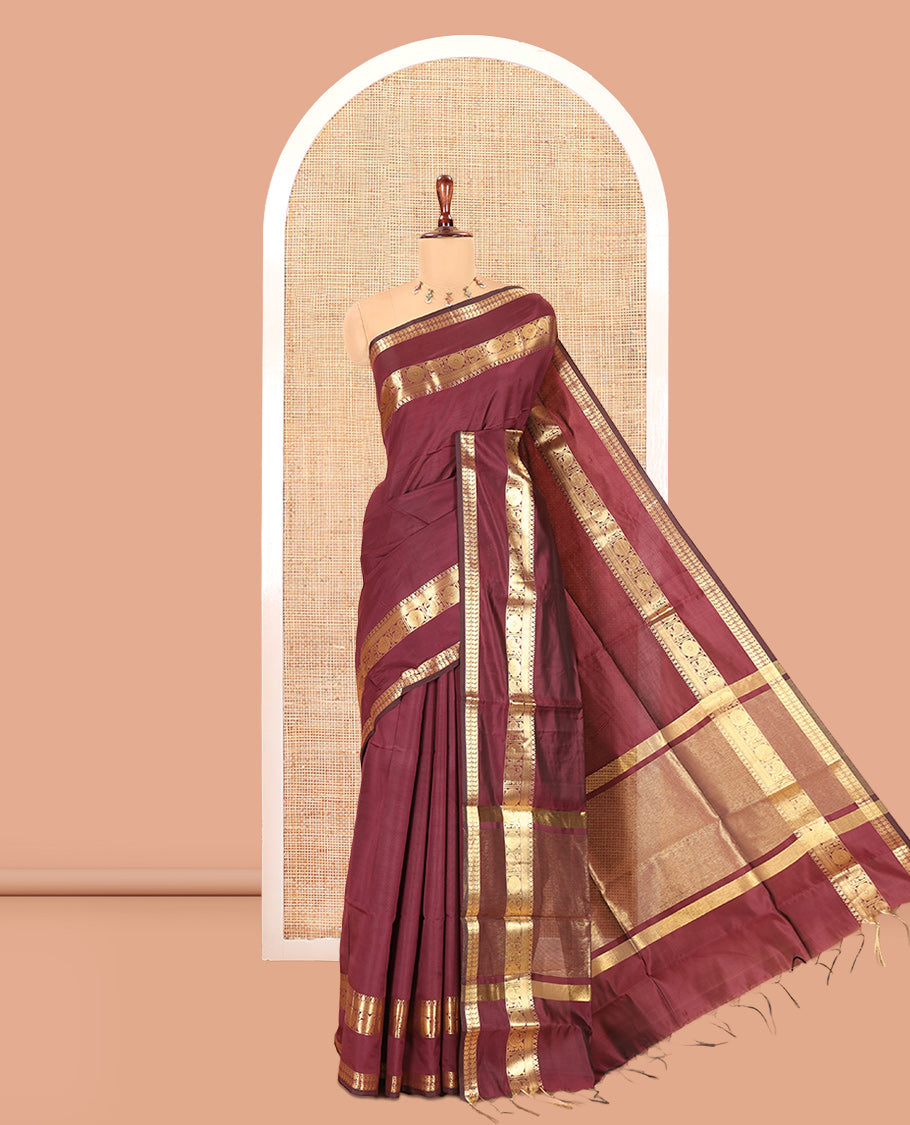 Purple Plain Semi-Katan Silk Saree, Highlighted by a Traditional Zari Border, Intricate Pallu, a Matching Blouse