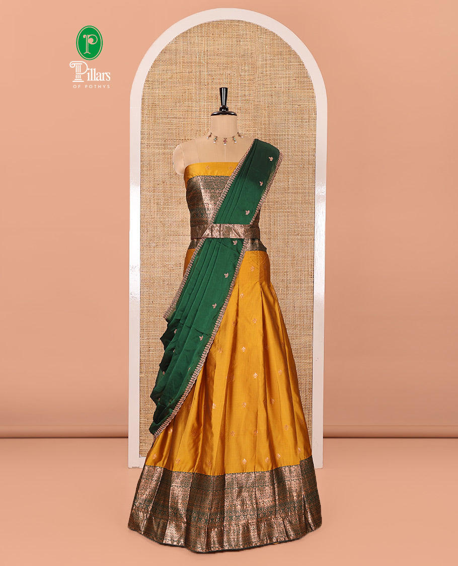 Yellow and Green Semi-Banarasi Half-Saree Beautifully Bedecked with Zari Buttas on Its Skirt, Complemented by a Contrast Traditional Zari Design Border, Paired with a Matching Blouse, and a Satin Georgette Embroidered Scallop Dhavani