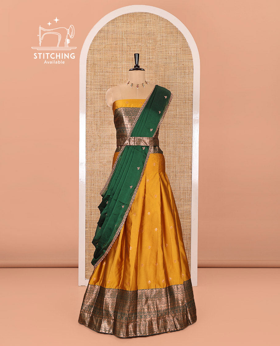 Yellow and Green Semi-Banarasi Half-Saree Beautifully Bedecked with Zari Buttas on Its Skirt, Complemented by a Contrast Traditional Zari Design Border, Paired with a Matching Blouse, and a Satin Georgette Embroidered Scallop Dhavani