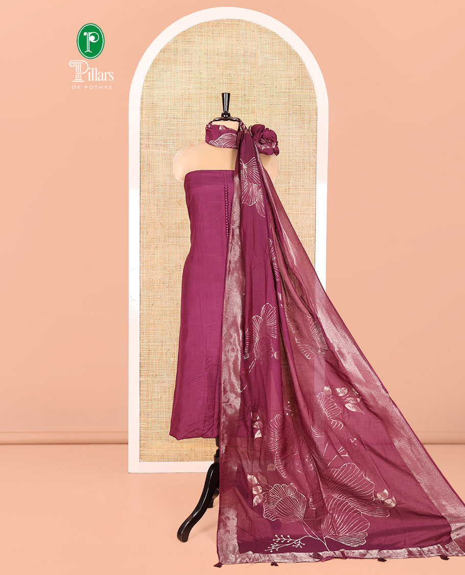 Purple Semi-Silk Material Chudidar Set, Adorned with Pom-Pom Necklined Top, a Plain Santoon Bottom, and Paired Floral Zari Woven Semi-Silk Dupatta