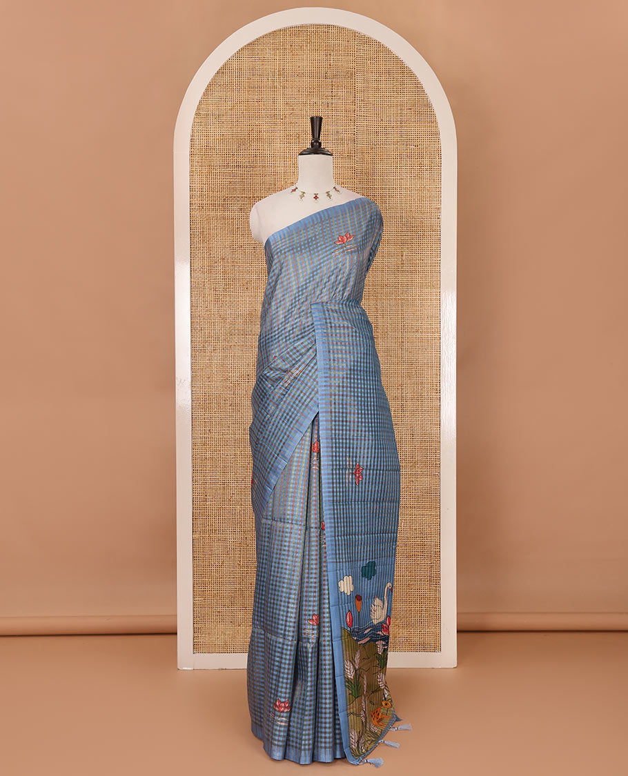 Borderless blue checked & lotus motifs kantha work-style printed fancy tussar saree, painting-style scenery printed pallu & lotus motifs printed blouse