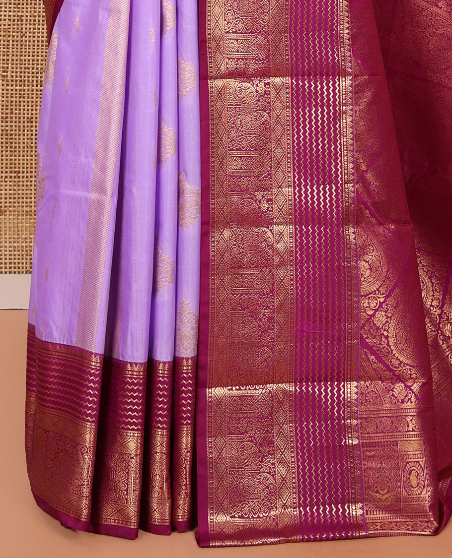 Lavender Kanchipuram Budget Silk Saree, Accentuated with Zari Buttas and Zari Stripes All Over Its Body, Complemented by a Contrast Traditional Zari Design Border, Zari-Rich Jaal Pallu, and Paired with a Contrast Blouse