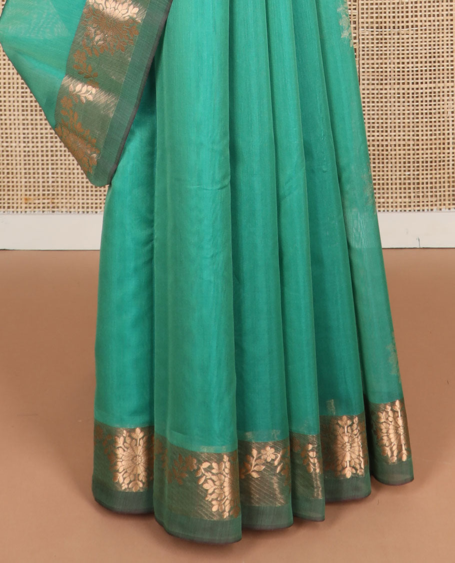 Sea green floral motifs silk cotton saree with contrast intricate zari design border & floral design pallu