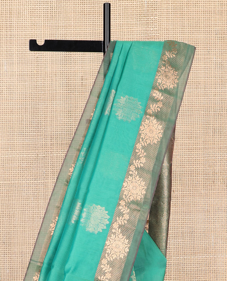 Sea green floral motifs silk cotton saree with contrast intricate zari design border & floral design pallu