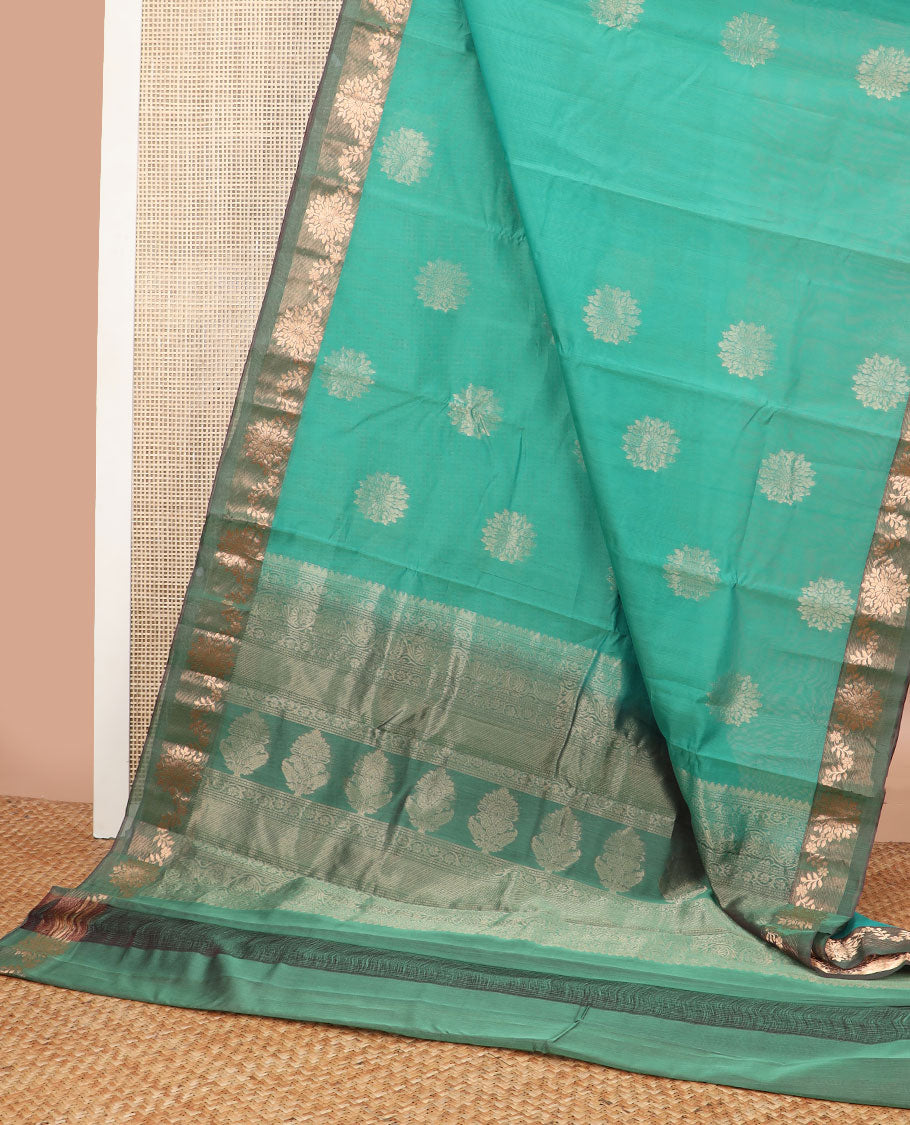 Sea green floral motifs silk cotton saree with contrast intricate zari design border & floral design pallu