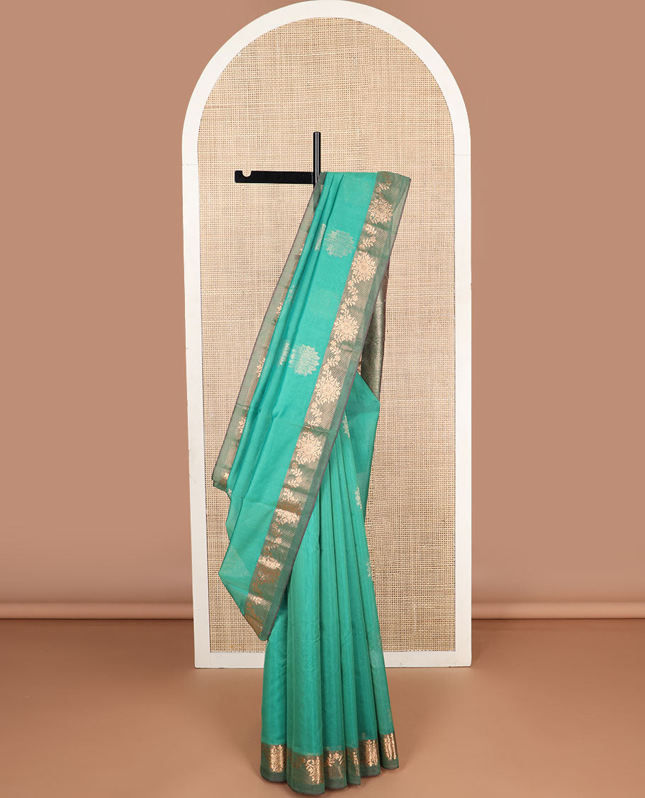 Sea green floral motifs silk cotton saree with contrast intricate zari design border & floral design pallu