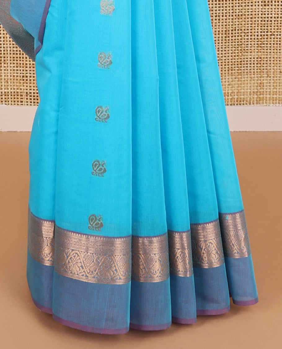 Light blue floral motifs silk cotton saree with contrast zari design border & intricate jaal design pallu