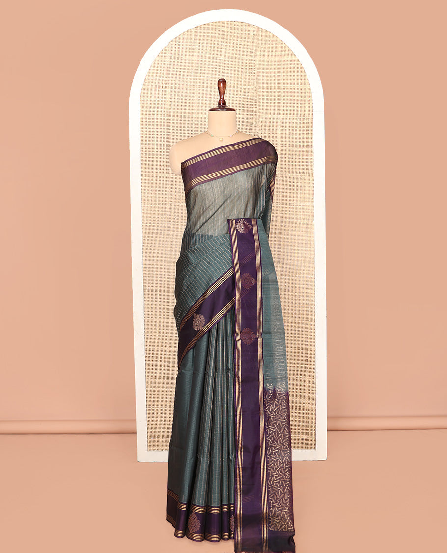 Grey Silk Cotton Saree, Subtly Sparkled With Stripes All Over Its Body Complemented by Contrast Zari Motifs Woven Border, Geometric Patterned Pallu and Paired with a Contrast Blouse
