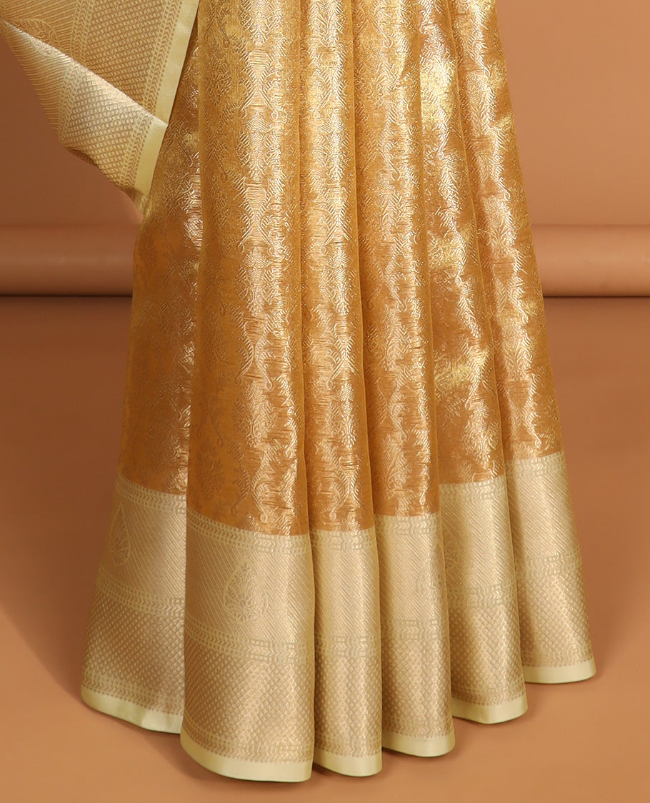 Light yellow floral jacquard semi tissue saree with contrast floral zari design border & floral design pallu
