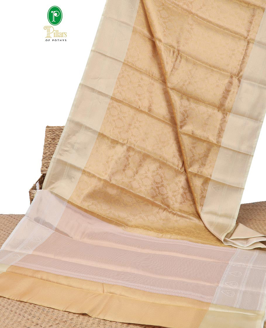 Light yellow floral jacquard semi tissue saree with contrast floral zari design border & floral design pallu