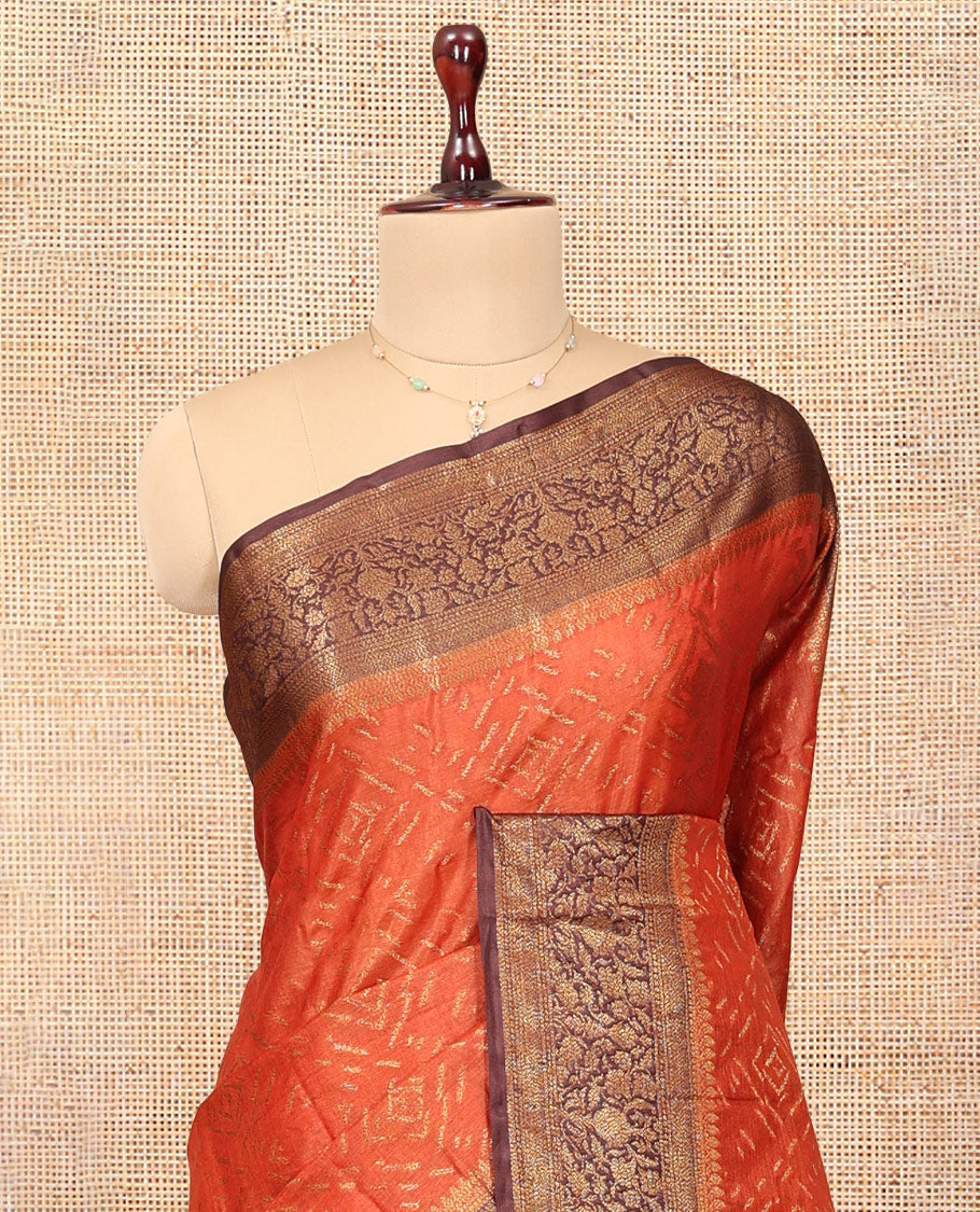 Orange Tussar Silk Saree Features Zari Designs, Complemented by a Contrast Floral Zari Border, Intricately Designed Pallu, and a Contrast Blouse