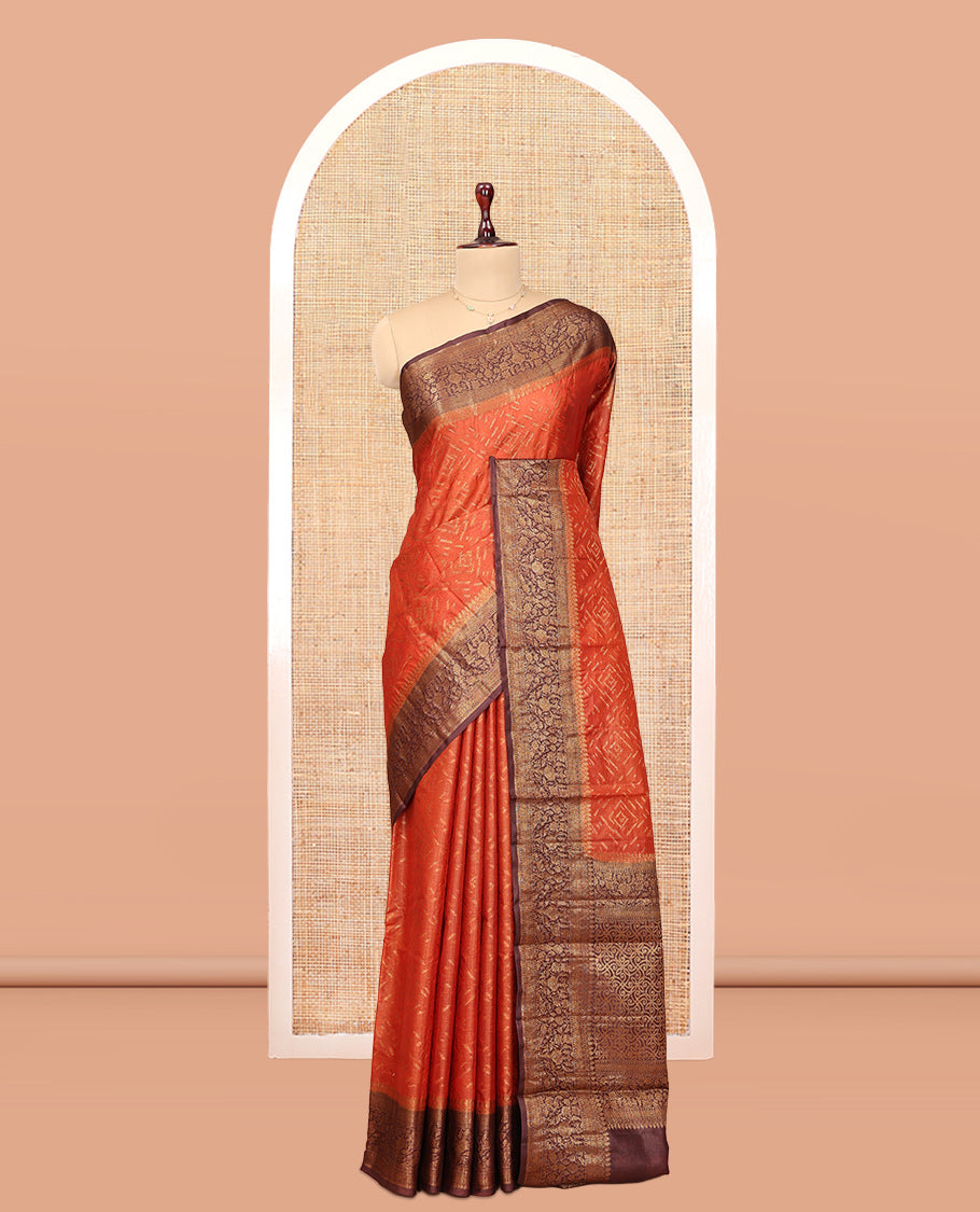 Orange Tussar Silk Saree Features Zari Designs, Complemented by a Contrast Floral Zari Border, Intricately Designed Pallu, and a Contrast Blouse