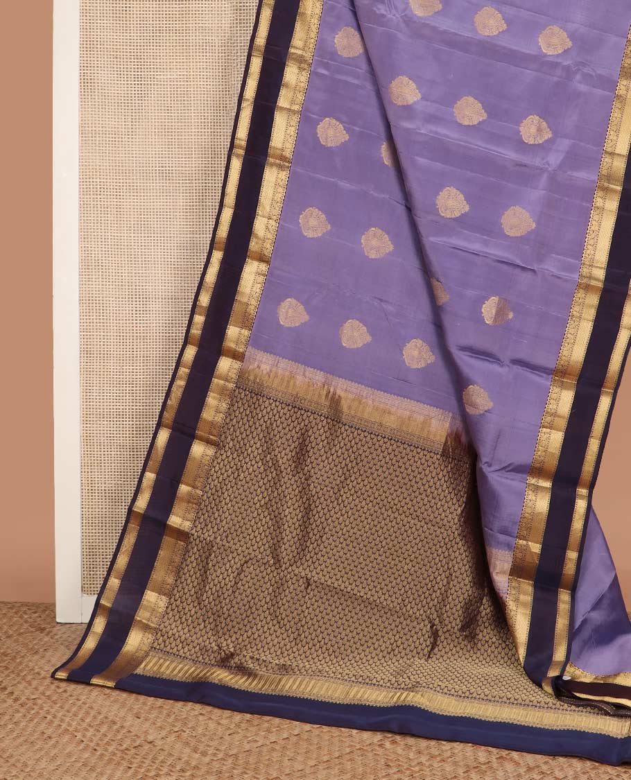 Lavender zari buttas Vasundhara silk mix saree, contrast rettai pettu border of manga, floral, and paiyaadi kattam designs, and zari design pallu
