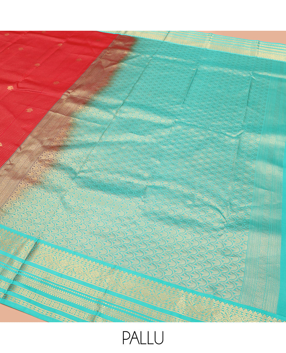 Red Vasundhara Lite Silk Mix Saree, Meticulously Crafted with Zari Buttas and Zari Stripes, Complemented by Contrast Border of Rekku, Rudraksham, Kodi Visiry, Muthu, and Kamalam Designs, Pallu Featuring Scallop Designs, and Paired with a Contrast Blouse