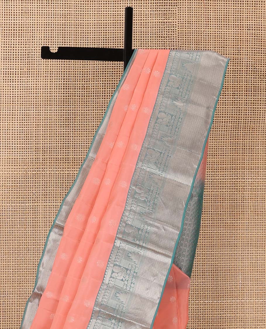 Peach zari buttas Vasundhara silk mix saree, contrast border of thilakam mokku, manga, mayil, neli, thazampoo rekku, and muthu designs, and jaal pallu