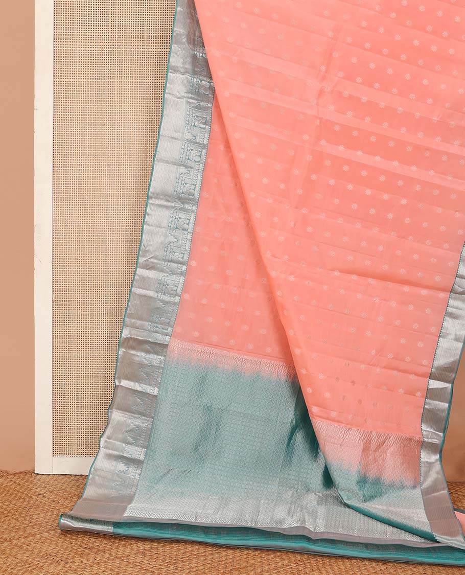 Peach zari buttas Vasundhara silk mix saree, contrast border of thilakam mokku, manga, mayil, neli, thazampoo rekku, and muthu designs, and jaal pallu
