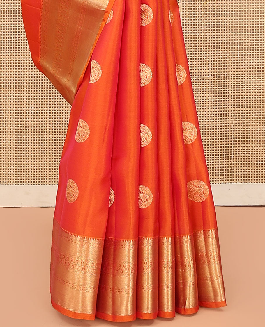 Orange Vasundhara Lite Silk Mix Saree, Showcasing Zari Buttas on Its Body, Highlighted by Zari Border of Rekku, Muthu, Rudraksham, Mayil Kann, and Chakram Designs, Grand Jaal Pallu, and Paired with a Matching Blouse