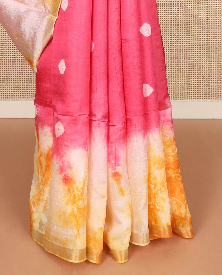 Pink shibori printed banana pith saree, contrast shibori printed border, and zari striped pallu