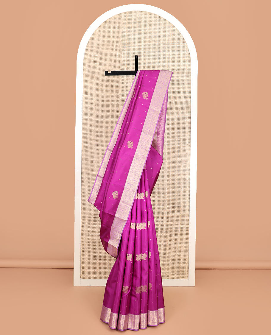 Rani pink mayil and yaanai buttas silk saree, contrast border of rekku, kathir, mayil, and yaanai designs, and pallu of geometric patterns