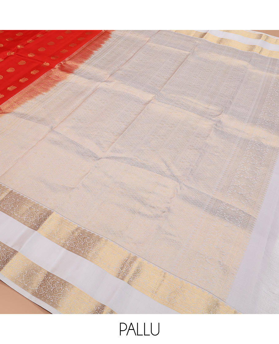 Orange arumbu manga buttas silk saree with contrast rettai pettu border of salngai, diamond, and kodi visiry designs, and intricate pallu