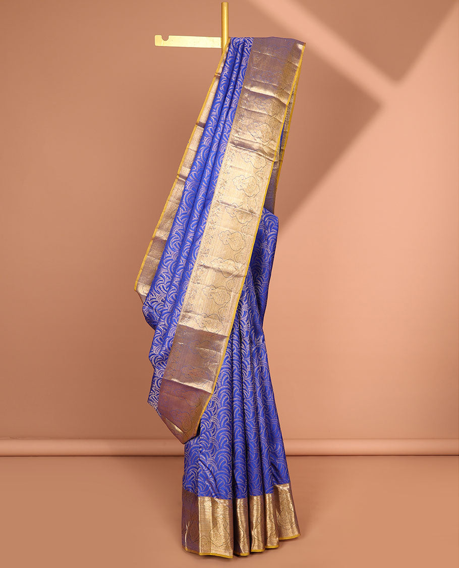 Blue geometric kancheepuram silk saree with contrast floral zari border & paisley design pallu