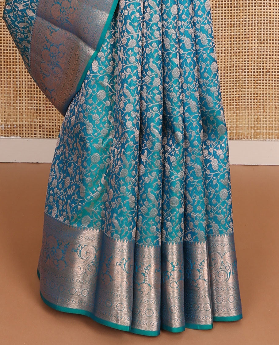 Blue vanasingari-style jacquard woven wedding silk saree, intricate pallu & border of thilakam mokku,kodi visiry,kathir,laddu kamalam & mayil